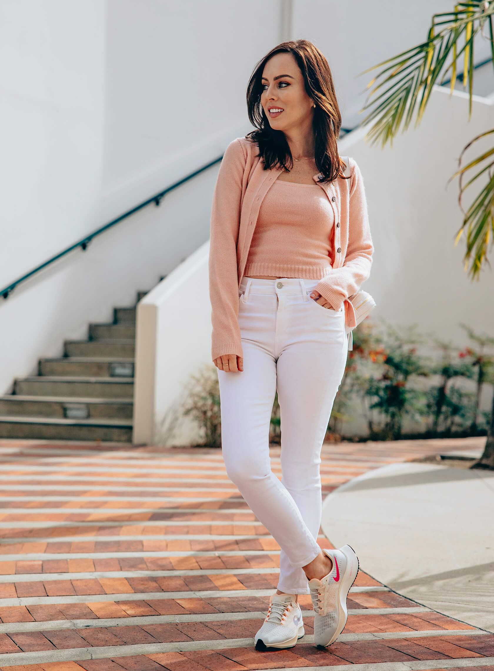 Sydne Style wears white jeans with 