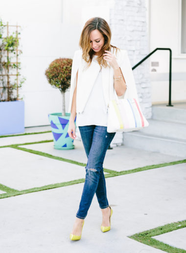 Sydne Summer wears BCBG white cape with 