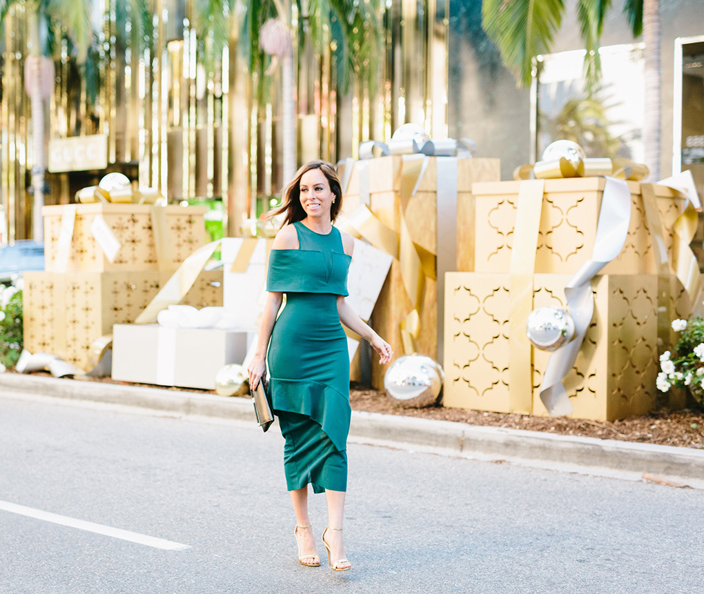 Sydne Style wears holiday party green dress on rodeo drive