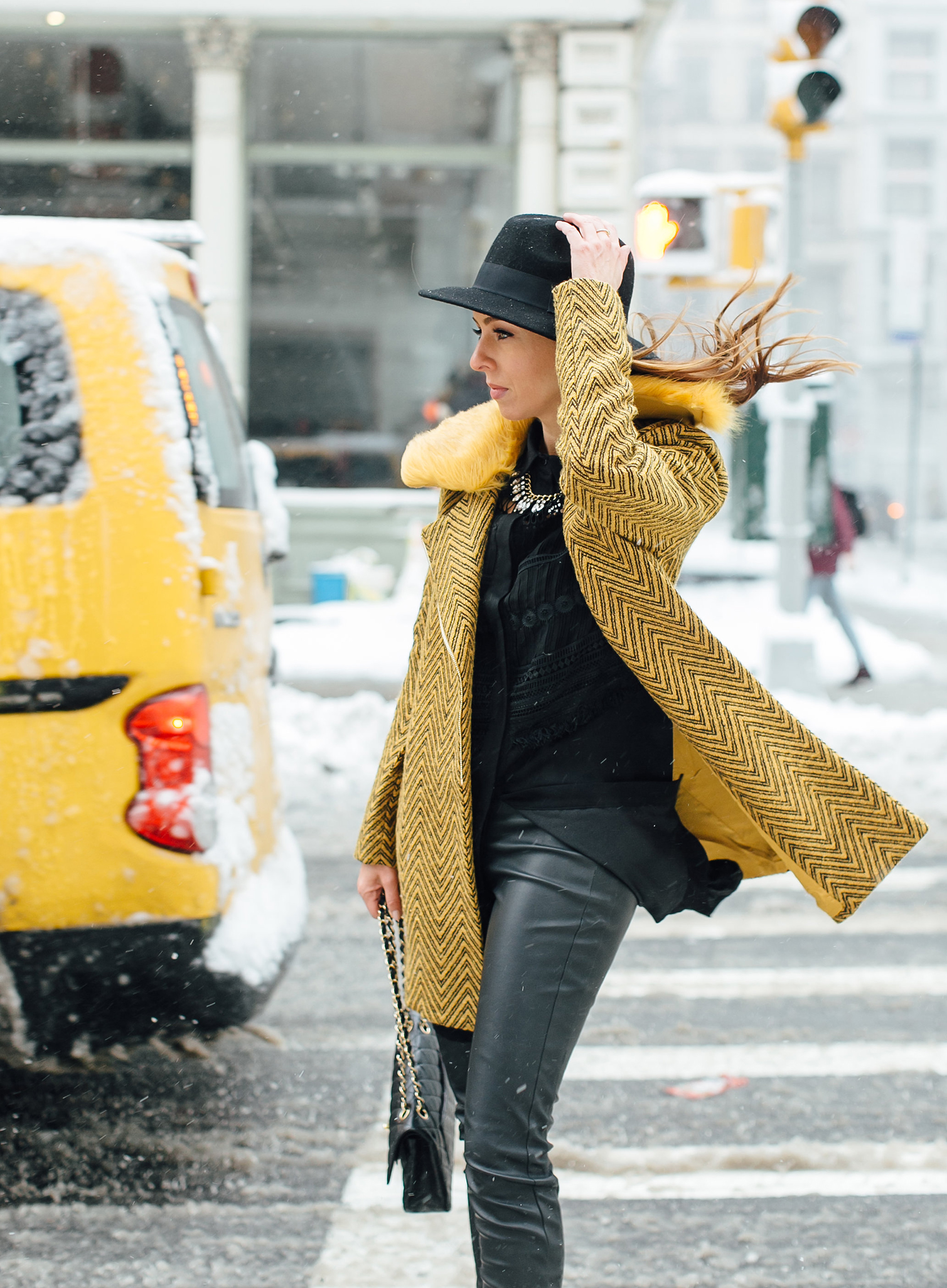 Sydne Style shows the best new york fashion week street style in yellow fur coat from lucy parisSydne Style shows the best new york fashion week street style in yellow fur coat from lucy paris
