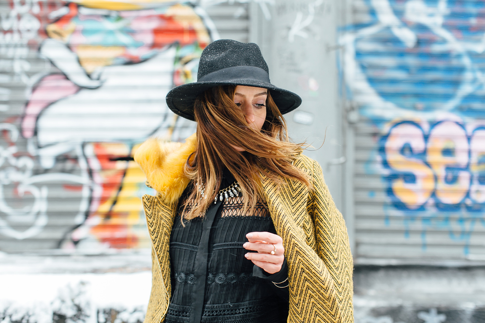 Sydne Style wears black fedora for new york fashion week street style