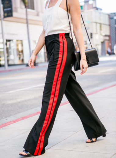 Sydne Style wears express track pants 