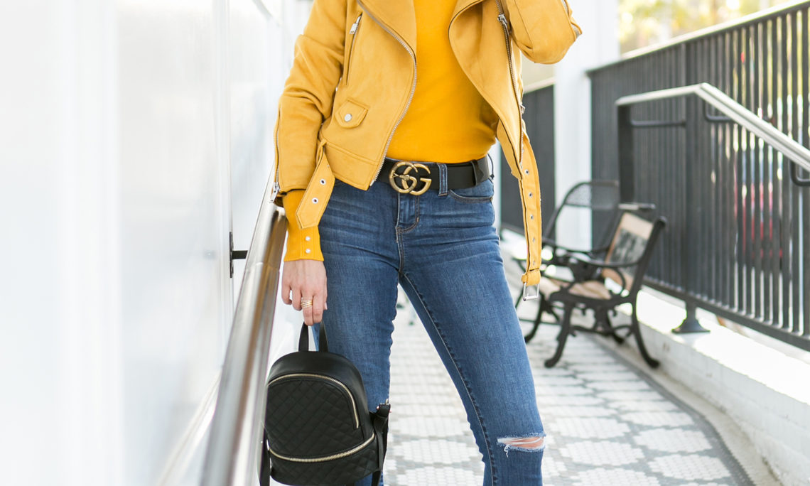 Sydne Style shows how to wear jewel tones for fall in mustard sweater