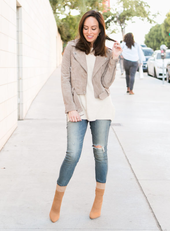 Sydne Style shows how to wear sock booties tucked into jeans Sydne Style