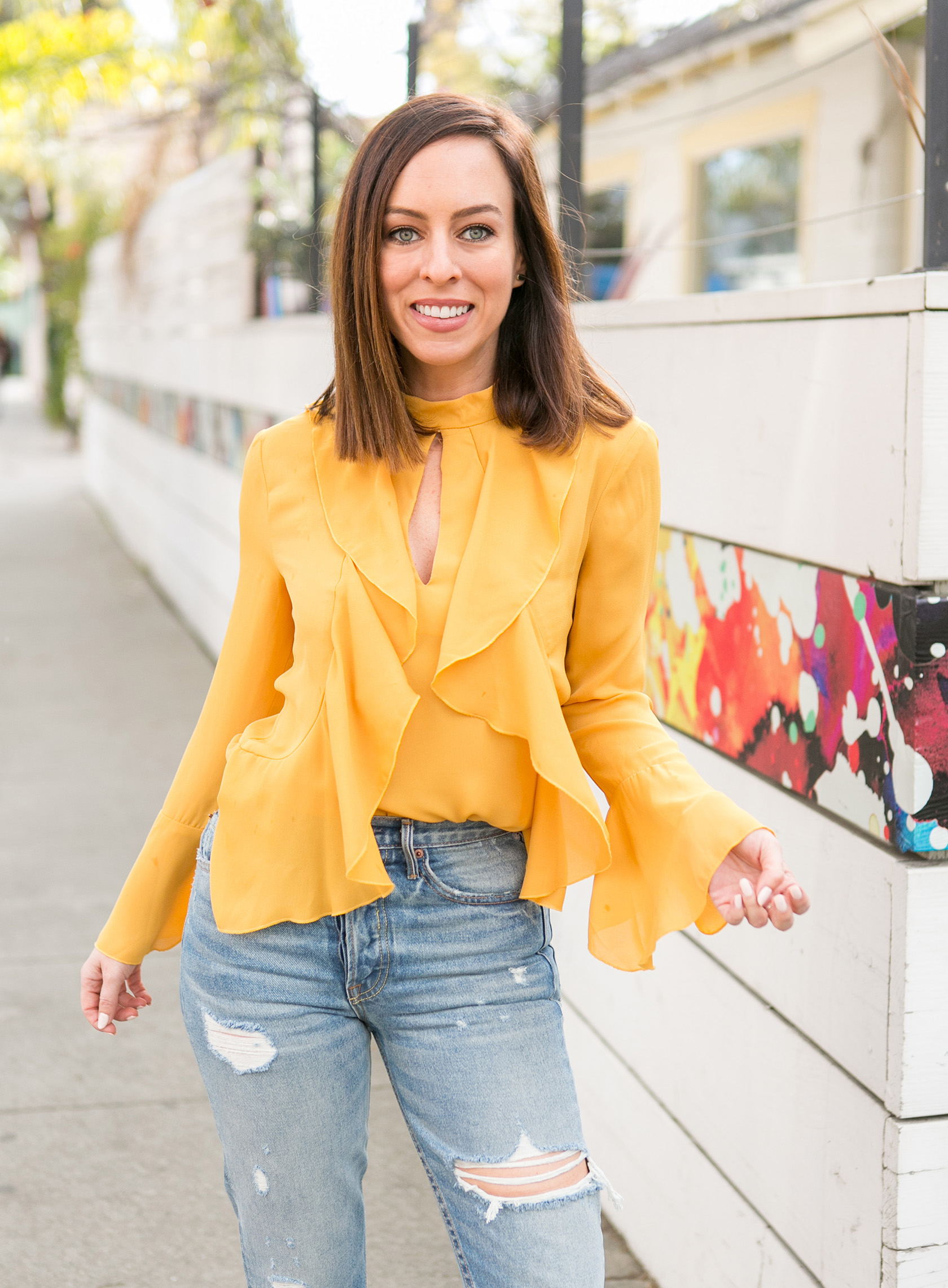 Sydne Style shows pretty mustard tops with bell sleeves