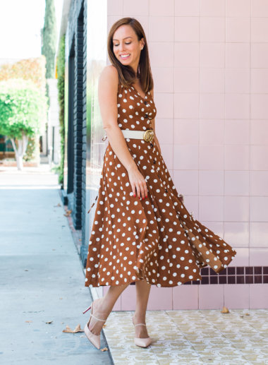 Sydne Style wears brown polka dot dress 