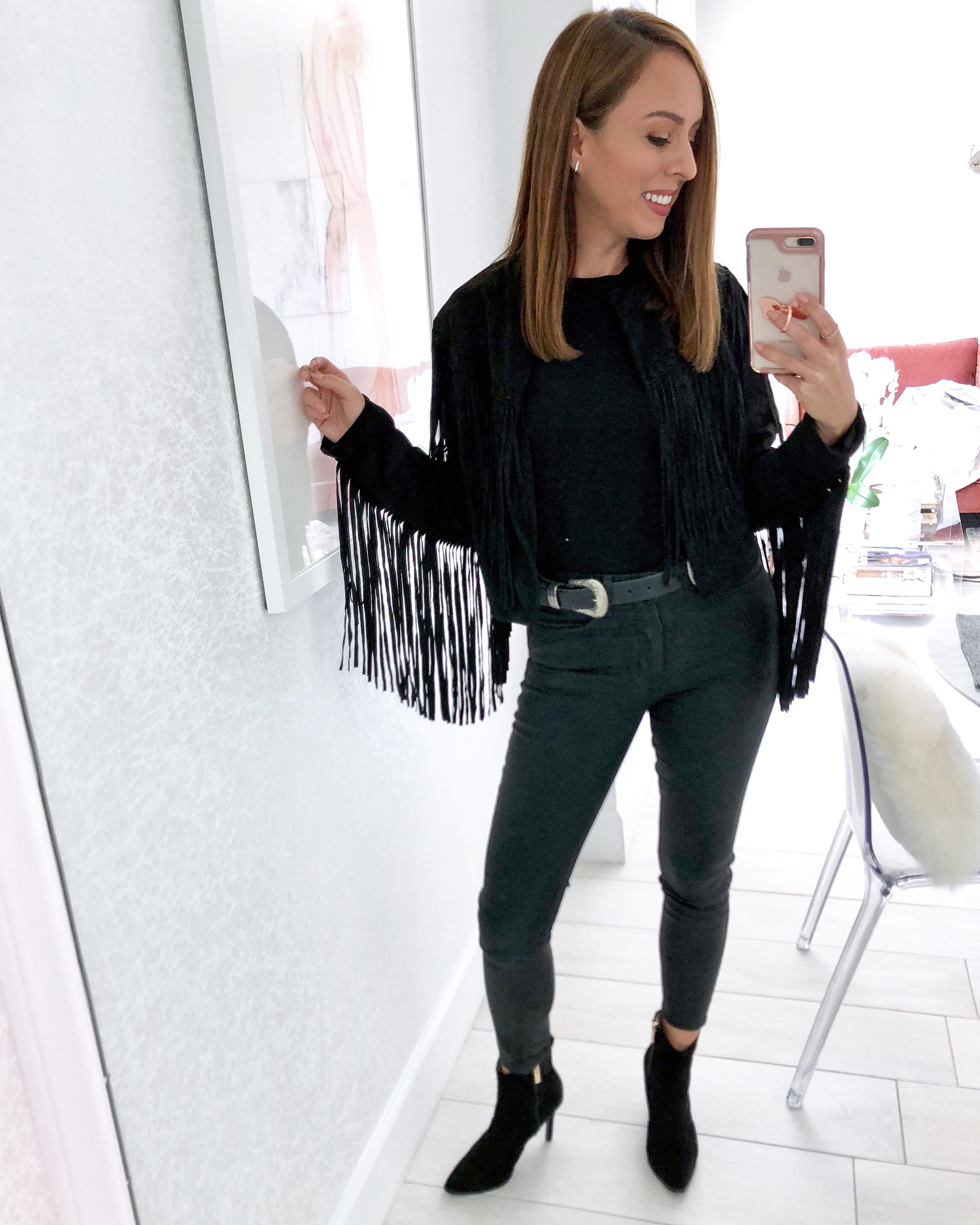 Sydne Style shows how to wear the western trend in black fringe jacket