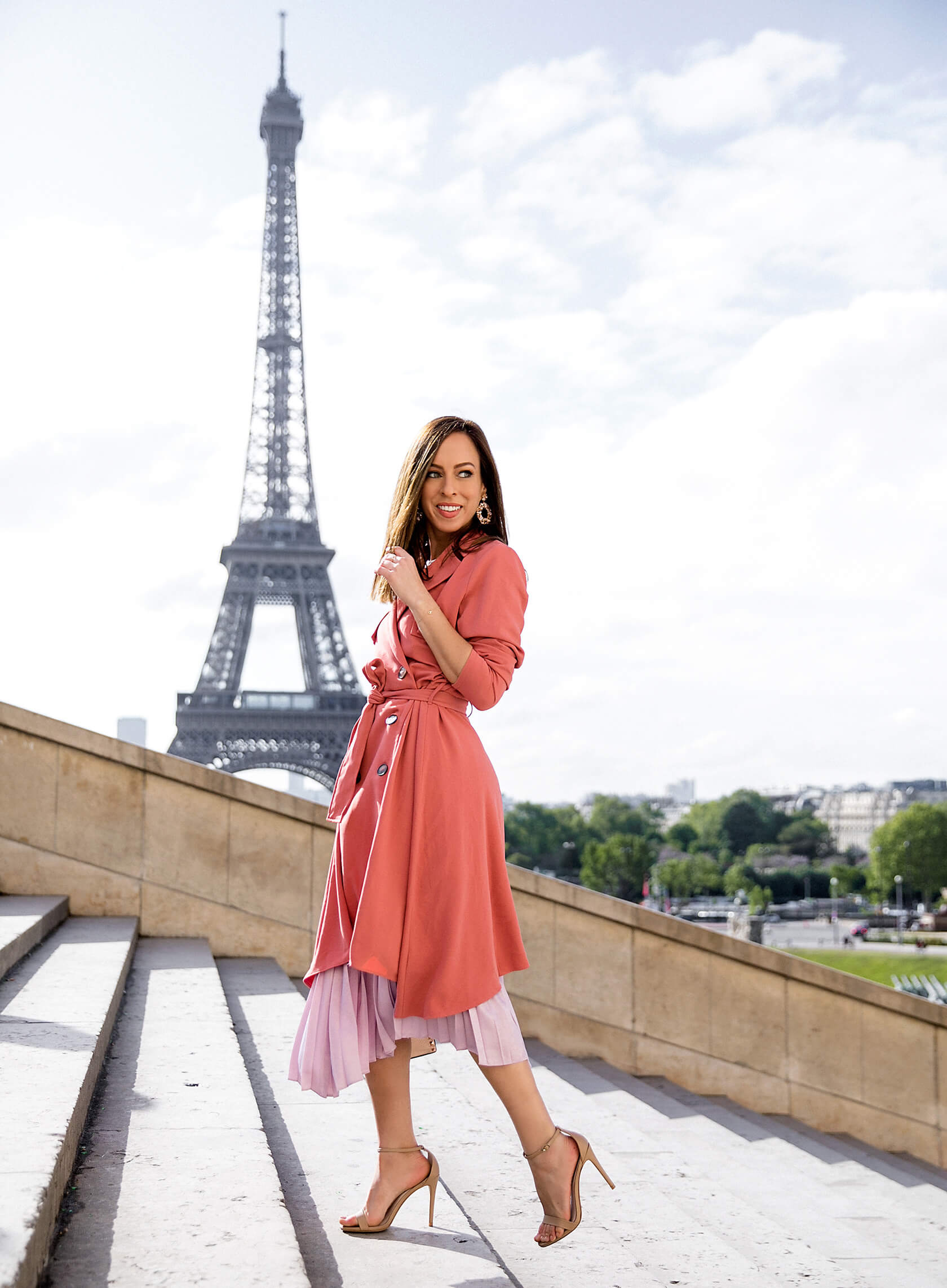 Sydne Style wears haryln trench coat at eiffel tower in paris