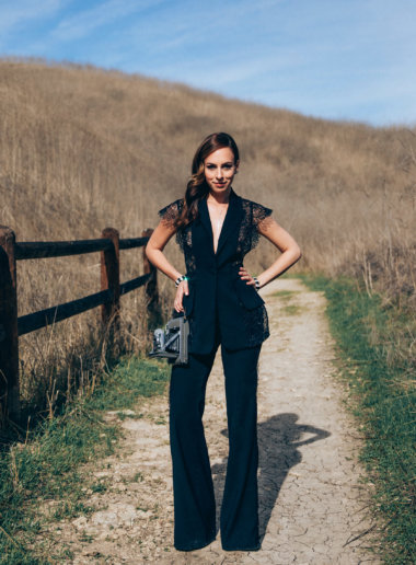 Sydne Style wears black lace pant suit 